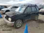 2000 Chevrolet Tracker with VIN 2CNBJ13C8Y6955130, listed as a Copart auction lot 89112385 with 289,680 mi miles and Salvage title. Bid and sale history available at DreamBid. Image 1.