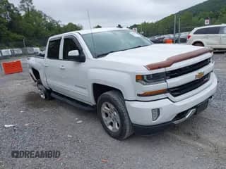 2017 Chevrolet Silverado 1500 LT z VIN 3GCUKREC0HG268718, wystawiony jako IAAI lot #43008048 z przebiegiem 87 748 mil mil oraz . Historia ofert i sprzedaży dostępna na DreamBid. Obrazek 1.