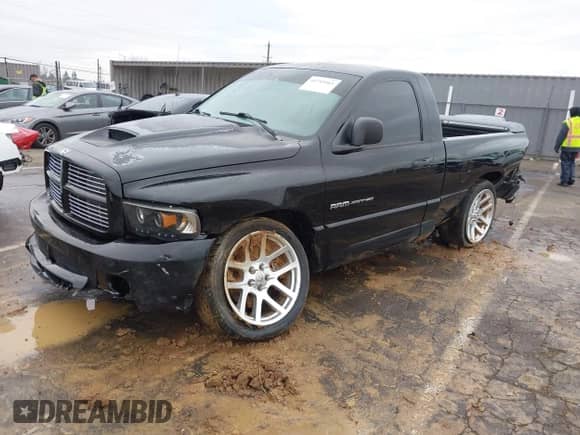 2004 Dodge RAM with VIN 3D3HA16H34G269900, listed as a IAAI auction lot 41715461 with 70,182 mi miles and . Bid and sale history available at DreamBid. Image 2.