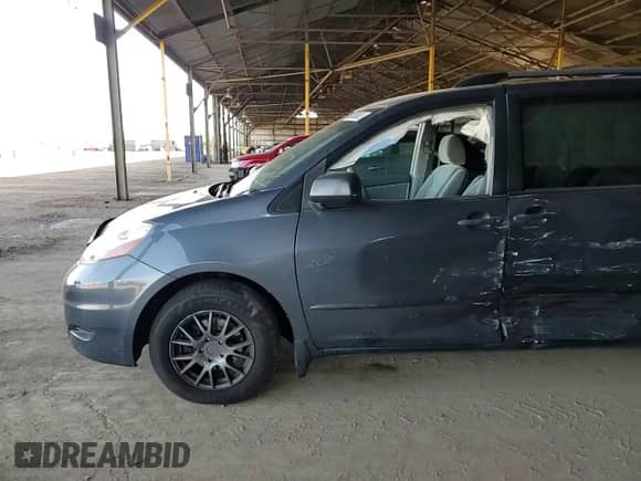 2009 Toyota Sienna CE с VIN 5TDZK29C59S236194, выставлен на аукционе Copart как лот 60360685 с пробегом 261 845 миль миль и Списание • Salvage title. История ставок и продаж доступна на DreamBid. Изображение 14.