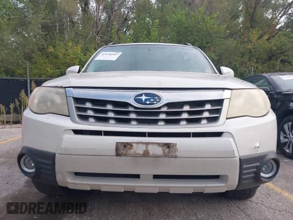 2012 Subaru Forester X Limited z VIN JF2SHBEC9CH440905, wystawiony jako IAAI lot #43238587 z przebiegiem 190 878 mil mil oraz . Historia ofert i sprzedaży dostępna na DreamBid. Obrazek 6.