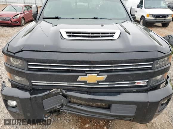 2019 Chevrolet Silverado 2500HD LTZ с VIN 1GC1KTEYXKF192705, выставлен на аукционе Copart как лот 70520645 с пробегом 260 862 миль миль и Списание • Salvage title. История ставок и продаж доступна на DreamBid. Изображение 11.