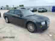 2009 Chrysler 300 LX with VIN 2C3KA43D19H500516, listed as a Copart auction lot 66175875 with 179,265 mi miles and Salvage title. Bid and sale history available at DreamBid. Image 4.