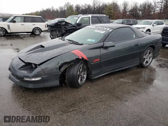 1994 Chevrolet Camaro Z28 z VIN 2G1FP22P4R2105947, wystawiony jako Copart lot #85064294 z przebiegiem 131 315 mil mil oraz Szkoda całkowita • Salvage title. Historia ofert i sprzedaży dostępna na DreamBid. Obrazek 1.