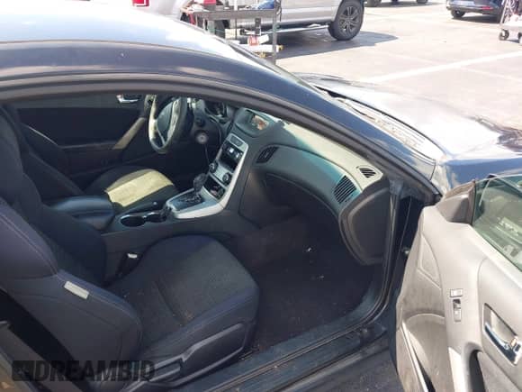 2010 Hyundai Genesis Coupe Track z VIN KMHHT6KD0AU041697, wystawiony jako IAAI lot #43233486 z przebiegiem 107 640 mil mil oraz . Historia ofert i sprzedaży dostępna na DreamBid. Obrazek 5.