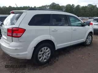 2017 Dodge Journey SE with VIN 3C4PDCAB5HT709512, listed as a IAAI auction lot 43389373 with 188,104 mi miles and . Bid and sale history available at DreamBid. Image 4.