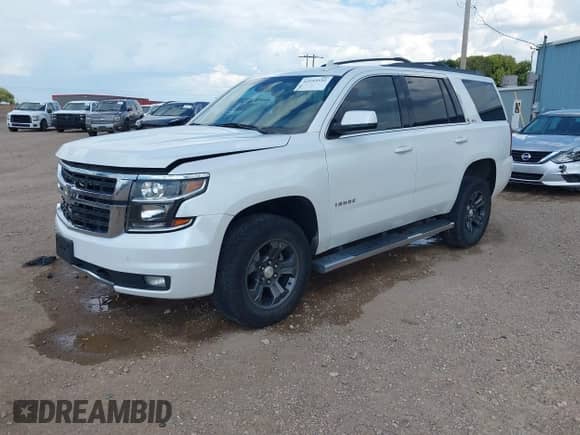 2016 Chevrolet Tahoe LT with VIN 1GNSKBKC0GR377950, listed as a IAAI auction lot 42803552 with 158,653 mi miles and . Bid and sale history available at DreamBid. Image 2.