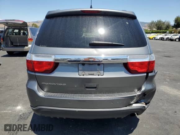2011 Dodge Durango Express with VIN 1D4RD2GG9BC615824, listed as a Copart auction lot 66359255 with 153,575 mi miles and Salvage title. Bid and sale history available at DreamBid. Image 6.