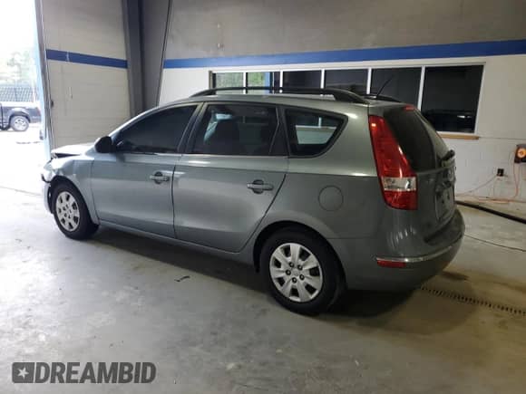 2010 Hyundai Elantra GLS with VIN KMHDC8AE7AU077374, listed as a Copart auction lot 53957815 with 139,734 mi miles and Salvage title. Bid and sale history available at DreamBid. Image 2.