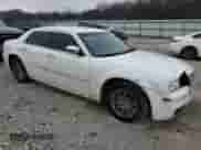 2010 Chrysler 300 Touring Signature with VIN 2C3CA5CV5AH326151, listed as a Copart auction lot 56032285 with 338,980 mi miles and Salvage title. Bid and sale history available at DreamBid. Image 4.