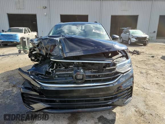 2022 Volkswagen Tiguan SE R-Line Black z VIN 3VVCB7AX9NM086989, wystawiony jako Copart lot #86275675 z przebiegiem 76 392 mil mil oraz Nie do naprawy • Non repairable. Historia ofert i sprzedaży dostępna na DreamBid. Obrazek 5.