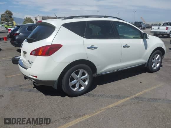 2009 Nissan Murano LE with VIN JN8AZ18W29W114654, listed as a IAAI auction lot 43076588 with 209,520 mi miles and . Bid and sale history available at DreamBid. Image 4.