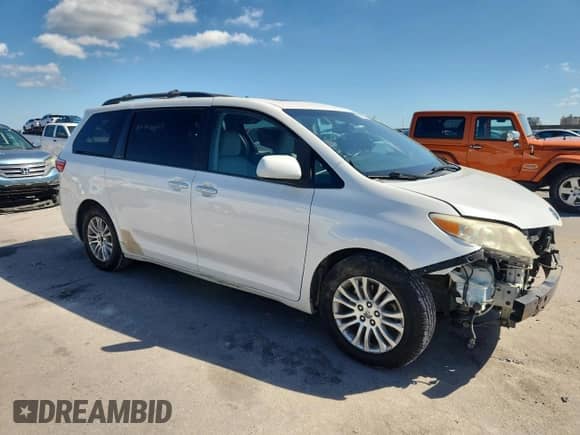 2015 Toyota Sienna XLE с VIN 5TDYK3DC6FS622465, выставлен на аукционе Copart как лот 87430055 с пробегом 229 379 миль миль и Списание • Salvage title. История ставок и продаж доступна на DreamBid. Изображение 4.