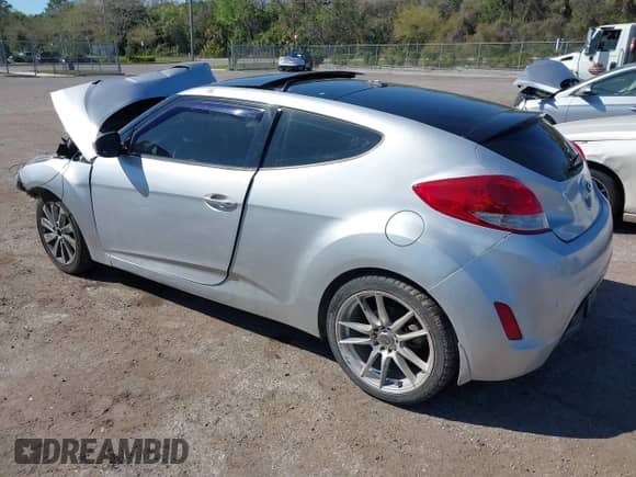 2012 Hyundai Veloster w/Black Int z VIN KMHTC6ADXCU036070, wystawiony jako IAAI lot #41779990 z przebiegiem Nie podano mil oraz . Historia ofert i sprzedaży dostępna na DreamBid. Obrazek 3.