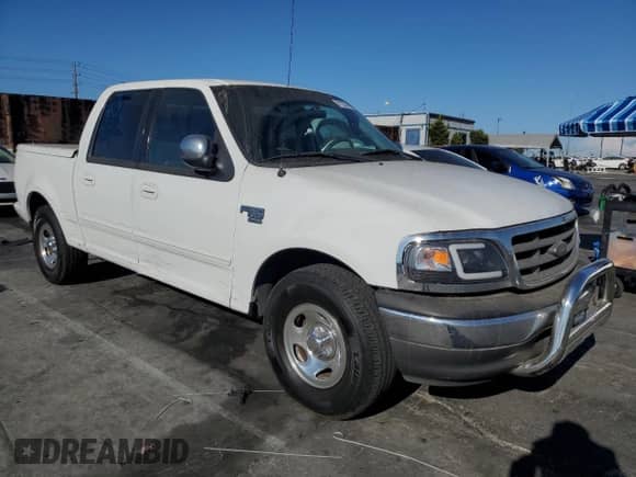 2002 Ford F-150 XLT с VIN 1FTRW07L52KA32293, выставлен на аукционе Copart как лот 81226245 с пробегом 472 017 миль миль и Списание • Salvage title. История ставок и продаж доступна на DreamBid. Изображение 4.
