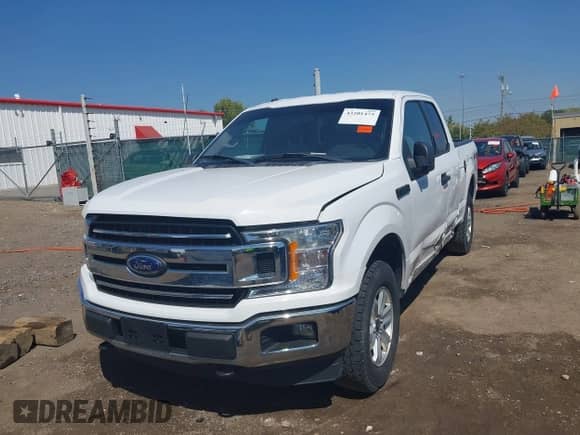 2018 Ford F-150 XL z VIN 1FTFX1E51JKE82628, wystawiony jako IAAI lot #43201475 z przebiegiem 79 461 mil mil oraz . Historia ofert i sprzedaży dostępna na DreamBid. Obrazek 12.
