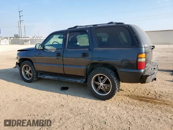 2004 Chevrolet Tahoe LT z VIN 1GNEC13Z44R313185, wystawiony jako Copart lot #81281225 z przebiegiem 231 798 mil mil oraz Szkoda całkowita • Salvage title. Historia ofert i sprzedaży dostępna na DreamBid. Obrazek 2.