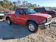 2002 Dodge Dakota z VIN 1B7FL16X42S720579, wystawiony jako Copart lot #88160015 z przebiegiem 164 279 mil mil oraz Szkoda całkowita • Salvage title. Historia ofert i sprzedaży dostępna na DreamBid. Obrazek 4.