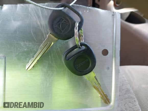 1999 Saturn SL z VIN 1G8ZK5274XZ304652, wystawiony jako IAAI lot #42618620 z przebiegiem 98 131 mil mil oraz . Historia ofert i sprzedaży dostępna na DreamBid. Obrazek 11.