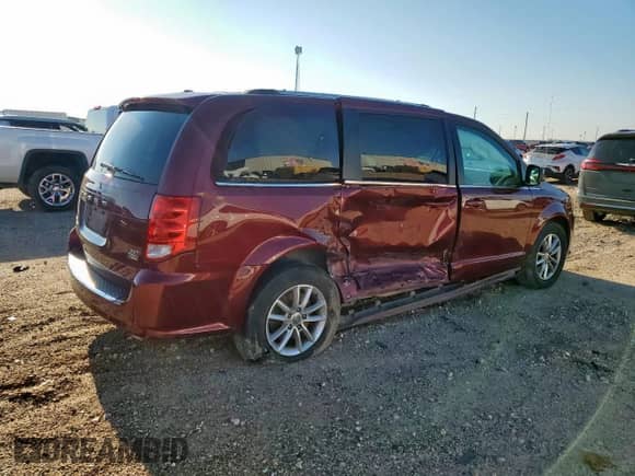 2018 Dodge Grand Caravan SXT with VIN 2C4RDGCG4JR299495, listed as a Copart auction lot 70832935 with 94,447 mi miles and Salvage title. Bid and sale history available at DreamBid. Image 3.