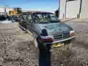 1993 Dodge Caravan Grand SE with VIN 1B4GH44R2PX757679, listed as a Copart auction lot 43034645 with 311,322 mi miles and Salvage title. Bid and sale history available at DreamBid. Image 11.
