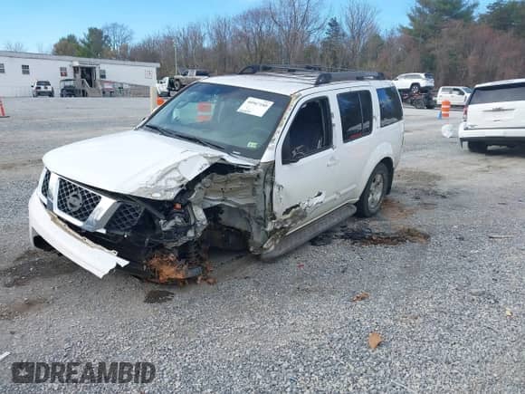 2005 Nissan Pathfinder SE with VIN 5N1AR18W25C767021, listed as a IAAI auction lot 40967180 with 215,836 mi miles and . Bid and sale history available at DreamBid. Image 2.