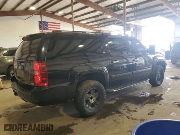 2007 Chevrolet Suburban LT с VIN 3GNFK16337G282112, выставлен на аукционе Copart как лот 80829135 с пробегом 220 208 миль миль и Списание • Salvage title. История ставок и продаж доступна на DreamBid. Изображение 3.