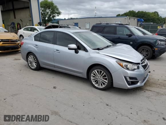 2016 Subaru Impreza Premium with VIN JF1GJAF63GH022976, listed as a Copart auction lot 69257935 with 97,458 mi miles and Salvage title. Bid and sale history available at DreamBid. Image 4.
