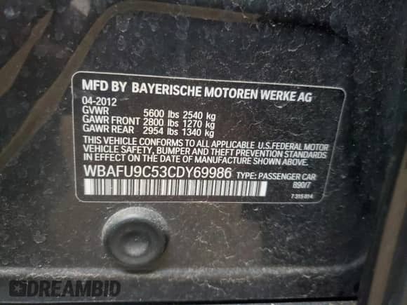 2012 BMW 5 Series 550i xDrive with VIN WBAFU9C53CDY69986, listed as a Copart auction lot 57281555 with 106,817 mi miles and Clean title. Bid and sale history available at DreamBid. Image 12.