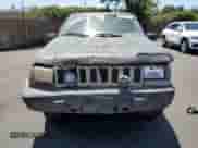 1995 Jeep Grand Cherokee Laredo с VIN 1J4GZ58Y4SC577119, выставлен на аукционе Copart как лот 56115775 с пробегом 236 628 миль миль и Списание • Salvage title. История ставок и продаж доступна на DreamBid. Изображение 5.