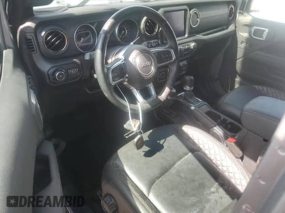 2021 Jeep Wrangler Unlimited Sahara High Altitude with VIN 1C4HJXEG5MW659306, listed as a Copart auction lot 74563914 with Not provided miles and Salvage title. Bid and sale history available at DreamBid. Image 8.