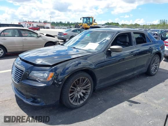 2014 Chrysler 300 C John Varvatos Luxury Edition with VIN 2C3CCADG3EH241821, listed as a IAAI auction lot 43268512 with 143,534 mi miles and . Bid and sale history available at DreamBid. Image 17.