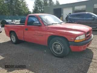 1999 Dodge Dakota SLT z VIN 1B7FL26Y7XS148560, wystawiony jako Copart lot #84033715 z przebiegiem 159 620 mil mil oraz Szkoda całkowita • Salvage title. Historia ofert i sprzedaży dostępna na DreamBid. Obrazek 4.