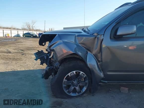 2020 Nissan Frontier Pro-4X with VIN 1N6ED0EB1LN708265, listed as a IAAI auction lot 41398914 with 98,665 mi miles and . Bid and sale history available at DreamBid. Image 17.