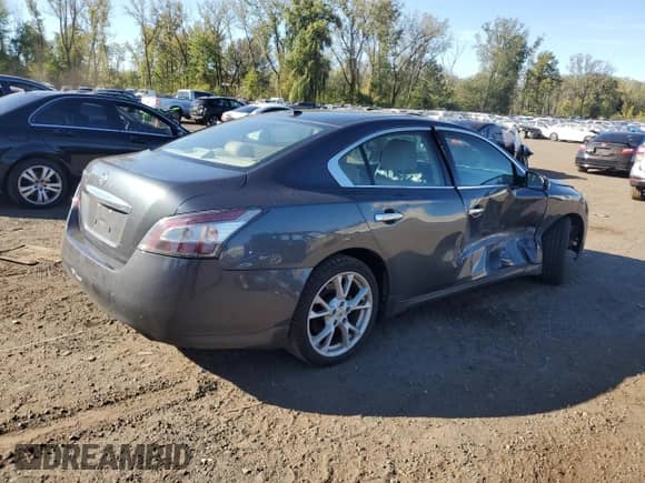 2013 Nissan Maxima S с VIN 1N4AA5AP4DC819694, выставлен на аукционе Copart как лот 84801075 с пробегом 127 634 миль миль и Списание • Salvage title. История ставок и продаж доступна на DreamBid. Изображение 3.