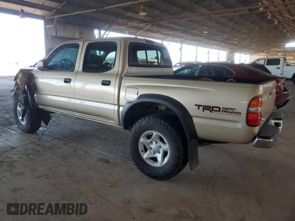 2001 Toyota Tacoma PreRunner z VIN 5TEGN92N71Z859665, wystawiony jako Copart lot #84799325 z przebiegiem 202 008 mil mil oraz Szkoda całkowita • Salvage title. Historia ofert i sprzedaży dostępna na DreamBid. Obrazek 2.