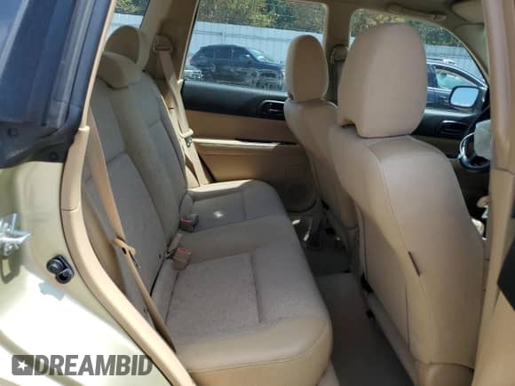 2004 Subaru Forester X with VIN JF1SG63664H728216, listed as a Copart auction lot 69270195 with 188,280 mi miles and Salvage title. Bid and sale history available at DreamBid. Image 10.