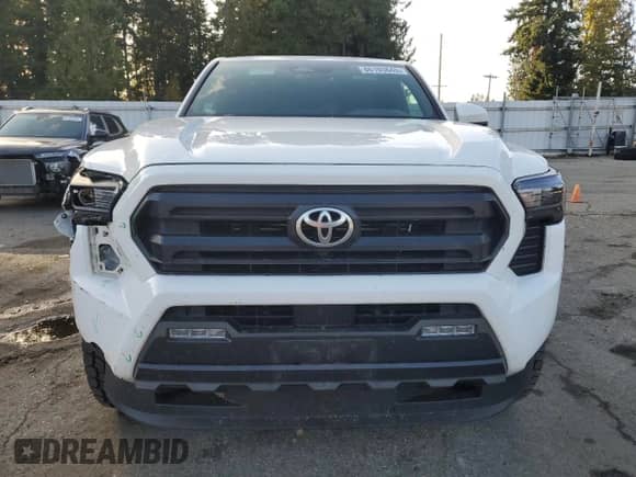 2024 Toyota Tacoma SR5 z VIN 3TYLB5JN5RT007412, wystawiony jako Copart lot #86193645 z przebiegiem 16 704 mil mil oraz Szkoda całkowita • Salvage title. Historia ofert i sprzedaży dostępna na DreamBid. Obrazek 5.