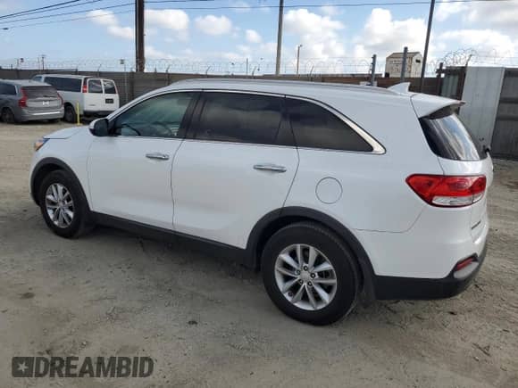 2018 Kia Sorento L with VIN 5XYPG4A35JG409441, listed as a Copart auction lot 82636915 with 203,445 mi miles and Clean title. Bid and sale history available at DreamBid. Image 2.