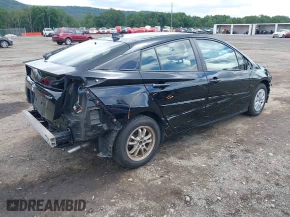 2016 Toyota Prius Two with VIN JTDKBRFU8G3013461, listed as a IAAI auction lot 42893690 with 108,926 mi miles and . Bid and sale history available at DreamBid. Image 4.