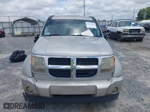 2009 Dodge Nitro SE z VIN 1D8GT28K79W532123, wystawiony jako IAAI lot #42627816 z przebiegiem 227 864 mil mil oraz . Historia ofert i sprzedaży dostępna na DreamBid. Obrazek 12.