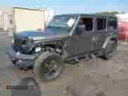 2021 Jeep Wrangler Unlimited Willys with VIN 1C4HJXDG2MW646904, listed as a IAAI auction lot 42267506 with 55,530 mi miles and . Bid and sale history available at DreamBid. Image 2.