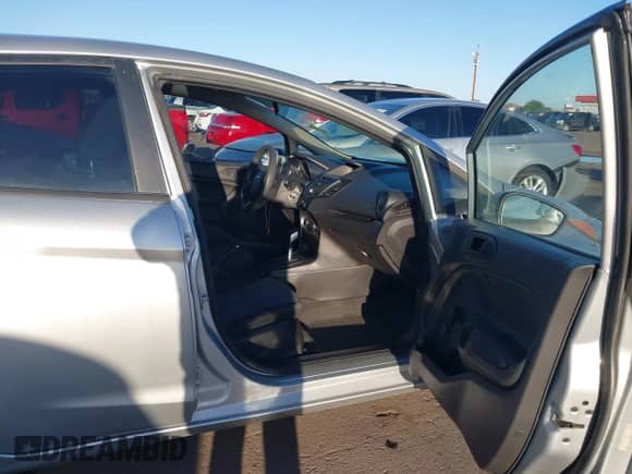 2015 Ford Fiesta S with VIN 3FADP4AJ6FM210934, listed as a IAAI auction lot 43434407 with 96,225 mi miles and . Bid and sale history available at DreamBid. Image 5.
