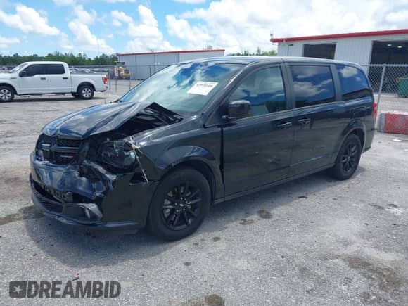 2019 Dodge Grand Caravan GT with VIN 2C4RDGEG2KR675982, listed as a IAAI auction lot 42970109 with 104,372 mi miles and . Bid and sale history available at DreamBid. Image 17.