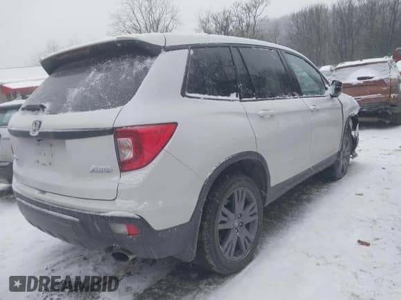 2019 Honda Passport EX-L with VIN 5FNYF8H53KB029769, listed as a IAAI auction lot 41311354 with 41,070 mi miles and . Bid and sale history available at DreamBid. Image 4.