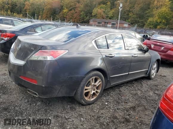 2009 Acura TL с VIN 19UUA86229A007420, выставлен на аукционе Copart как лот 87025745 с пробегом 264 927 миль миль и Списание • Salvage title. История ставок и продаж доступна на DreamBid. Изображение 3.