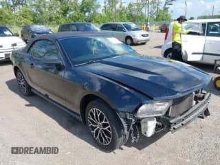 2012 Ford Mustang V6 with VIN 1ZVBP8EM2C5205421, listed as a IAAI auction lot 39669657 with 214,320 mi miles and . Bid and sale history available at DreamBid. Image 1.