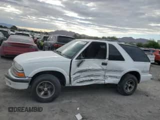 2000 Chevrolet Blazer LS z VIN 1GNCS18W6YK108426, wystawiony jako Copart lot #54915225 z przebiegiem 150 041 mil mil oraz Szkoda całkowita • Salvage title. Historia ofert i sprzedaży dostępna na DreamBid. Obrazek 1.