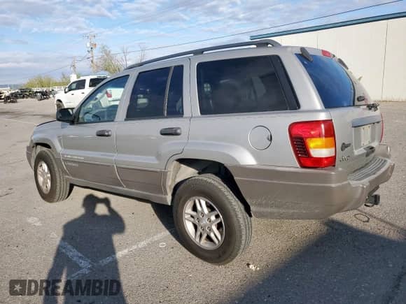 2004 Jeep Grand Cherokee Laredo with VIN 1J4GX48S94C313442, listed as a Copart auction lot 86679925 with 52,727 mi miles and Salvage title. Bid and sale history available at DreamBid. Image 2.