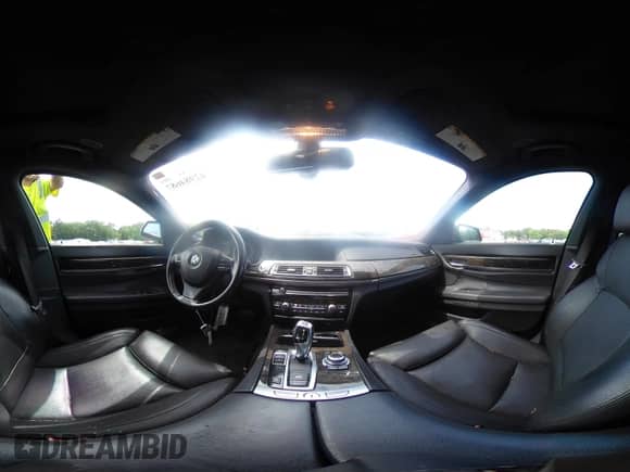 2012 BMW 7 Series 740Li with VIN WBAKB4C50CC575863, listed as a IAAI auction lot 42984687 with 102,302 mi miles and . Bid and sale history available at DreamBid. Image 21.